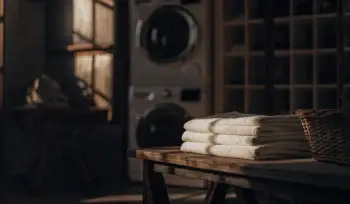 Folded laundry in a wicker basket.