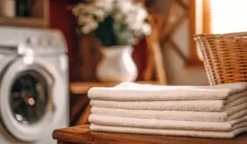 Folded laundry and washing machine.