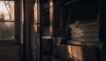 Clean healthcare linens stacked in Bay Shore.