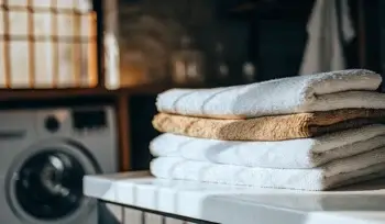Clean, folded towels. Melville laundry service.