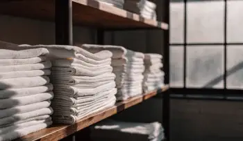 Clean healthcare linens folded and stacked in Rockville Centre.
