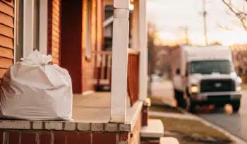 Best laundry pickup and delivery service in Mineola. Laundry bag awaiting pickup.