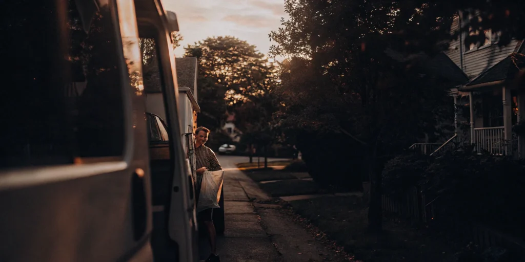 Man getting his laundry from the best pickup and delivery service in Massapequa Park.