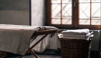 A stack of clean bedding from a professional comforter cleaning service in Centre Island.