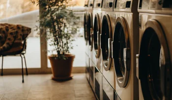 Row of modern washing machines in one of the best laundromats in Lattingtown.