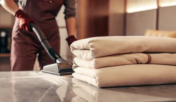 A fresh, folded comforter after professional cleaning in Glenwood Landing.