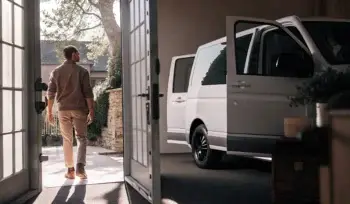 A laundry service professional picks up towels in Cold Spring Hills.