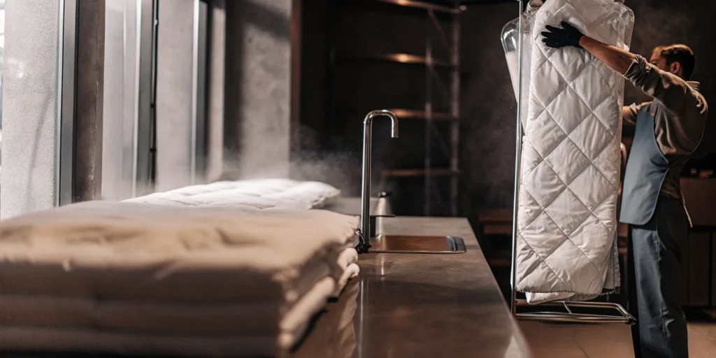 A freshly cleaned, fluffy comforter from a professional cleaning service in Port Washington.