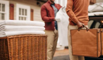 A stack of folded laundry from a laundry pickup service in Cold Spring Harbor.