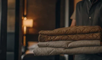 Professionally cleaned comforters folded and ready for delivery in Roslyn Heights.