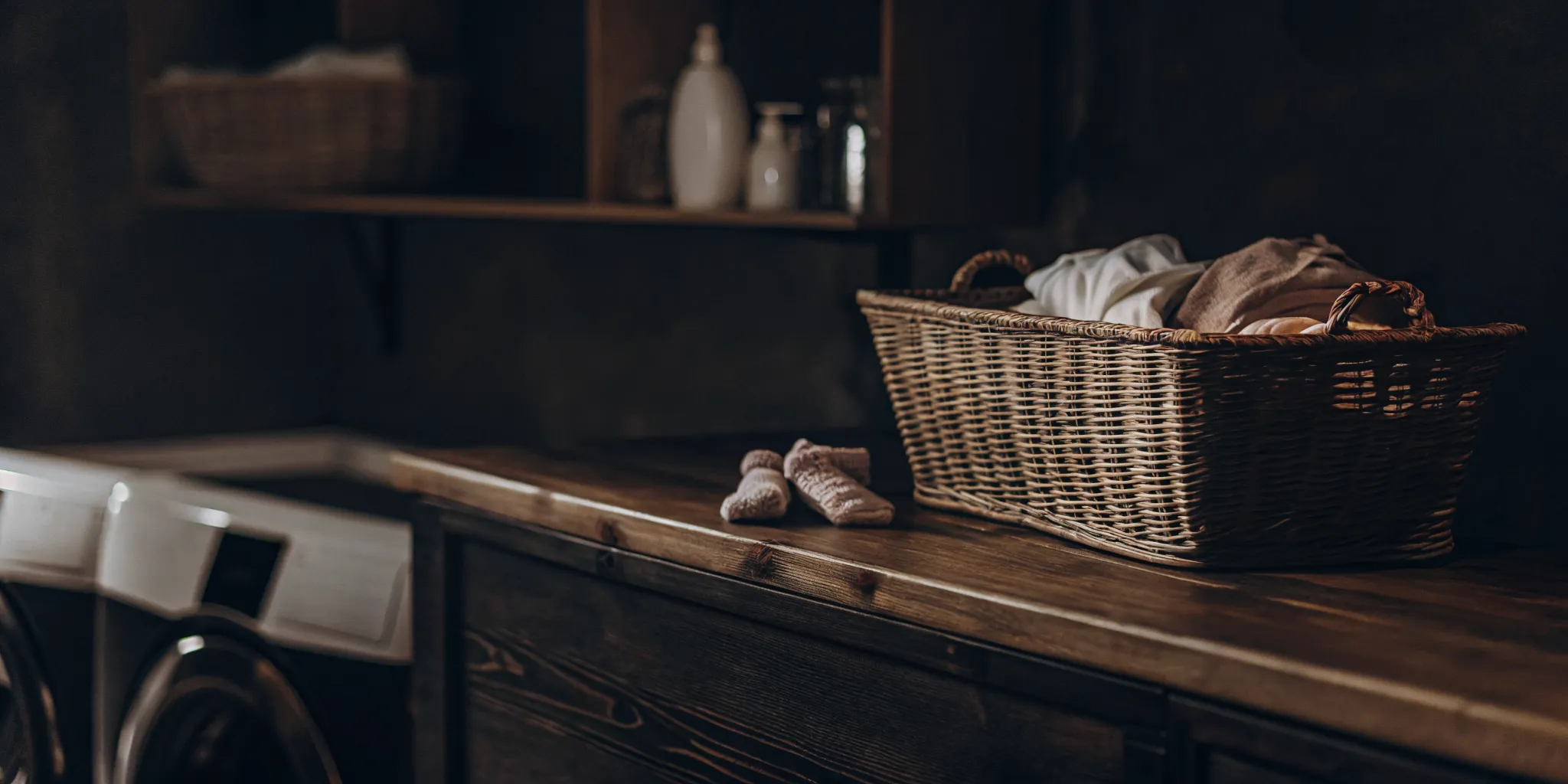 Basket of clean baby clothes from a Long Island laundry service.